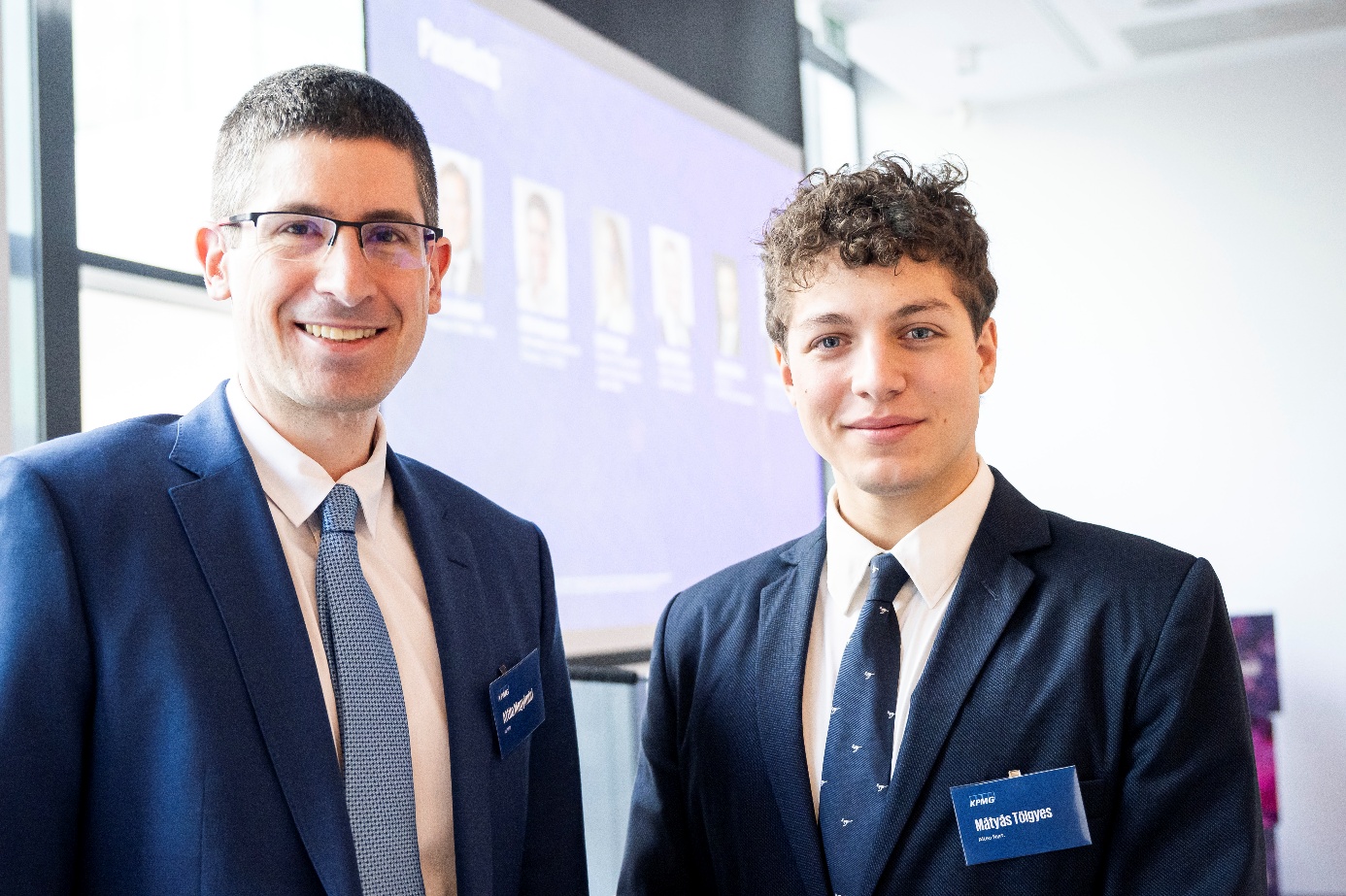 Attila Megyimóri (Director for International Relations, left) and Mátyás Tölgyes (International Business Expert, right) together at a presentation event.